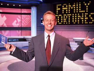 File:Family fortunes shrug.jpg